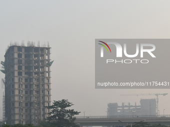 High-rise buildings are pictured on a polluted, smoggy morning in Kolkata, India, on November 8, 2024. (