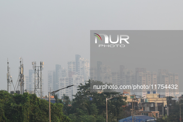 High-rise buildings are pictured on a polluted, smoggy morning in Kolkata, India, on November 8, 2024. 