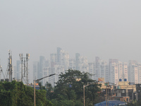 High-rise buildings are pictured on a polluted, smoggy morning in Kolkata, India, on November 8, 2024. (