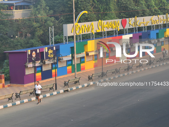 A person runs on the street on an air-polluted morning in Kolkata, India, on November 8, 2024. (