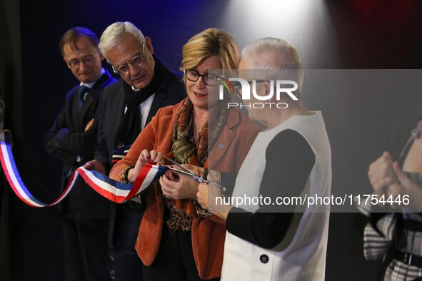 French Delegate Minister for Rural Affairs, Trade and Crafts Francoise Gatel (white jacket) and French Delegate Minister for Social and Soli...