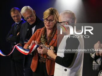 French Delegate Minister for Rural Affairs, Trade and Crafts Francoise Gatel (white jacket) and French Delegate Minister for Social and Soli...