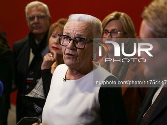 French Delegate Minister for Rural Affairs, Trade and Crafts Francoise Gatel (white jacket) speaks with the press as she opens the 12th edit...