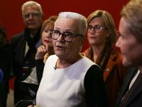 French Delegate Minister for Rural Affairs, Trade and Crafts Francoise Gatel (white jacket) speaks with the press as she opens the 12th edit...