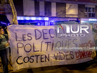 Catalan left-wing and independentist groups demonstrate in front of the headquarters of the Popular Party, led by the regional government of...