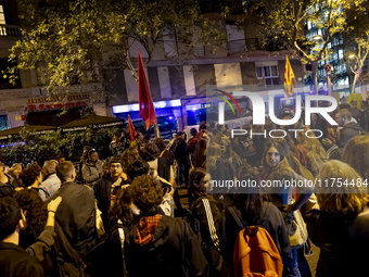 Catalan left-wing and independentist groups demonstrate in front of the headquarters of the Popular Party, led by the regional government of...