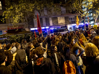 Catalan left-wing and independentist groups demonstrate in front of the headquarters of the Popular Party, led by the regional government of...