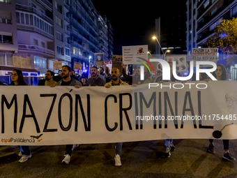 Catalan left-wing and independentist groups demonstrate in front of the headquarters of the Popular Party, led by the regional government of...