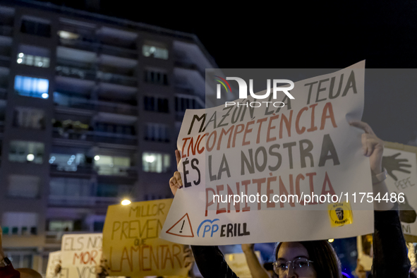 Catalan left-wing and independentist groups demonstrate in front of the headquarters of the Popular Party, led by the regional government of...