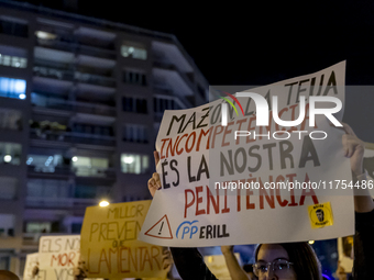 Catalan left-wing and independentist groups demonstrate in front of the headquarters of the Popular Party, led by the regional government of...