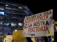 Catalan left-wing and independentist groups demonstrate in front of the headquarters of the Popular Party, led by the regional government of...