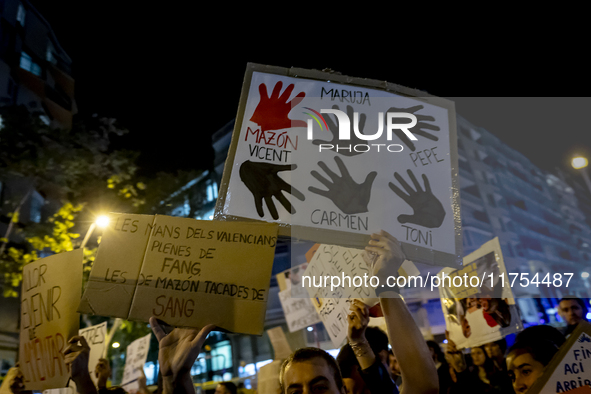 Catalan left-wing and independentist groups demonstrate in front of the headquarters of the Popular Party, led by the regional government of...