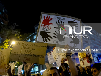 Catalan left-wing and independentist groups demonstrate in front of the headquarters of the Popular Party, led by the regional government of...