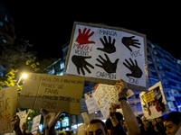 Catalan left-wing and independentist groups demonstrate in front of the headquarters of the Popular Party, led by the regional government of...