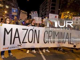 Catalan left-wing and independentist groups demonstrate in front of the headquarters of the Popular Party, led by the regional government of...