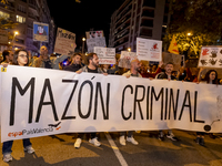 Catalan left-wing and independentist groups demonstrate in front of the headquarters of the Popular Party, led by the regional government of...