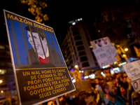 Catalan left-wing and independentist groups demonstrate in front of the headquarters of the Popular Party, led by the regional government of...