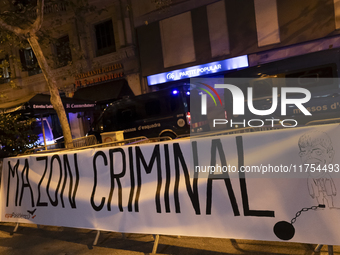 Catalan left-wing and independentist groups demonstrate in front of the headquarters of the Popular Party, led by the regional government of...