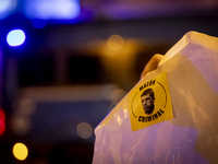 Catalan left-wing and independentist groups demonstrate in front of the headquarters of the Popular Party, led by the regional government of...