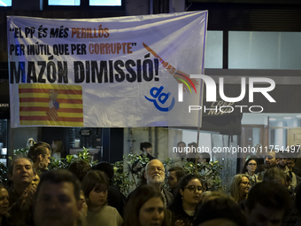 Catalan left-wing and independentist groups demonstrate in front of the headquarters of the Popular Party, led by the regional government of...