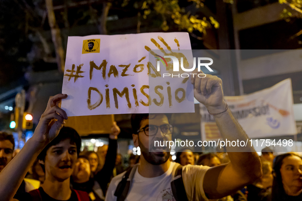 Catalan left-wing and independentist groups demonstrate in front of the headquarters of the Popular Party, led by the regional government of...