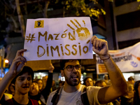 Catalan left-wing and independentist groups demonstrate in front of the headquarters of the Popular Party, led by the regional government of...