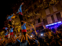 Catalan left-wing and independentist groups demonstrate in front of the headquarters of the Popular Party, led by the regional government of...