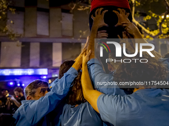 Catalan left-wing and independentist groups demonstrate in front of the headquarters of the Popular Party, led by the regional government of...