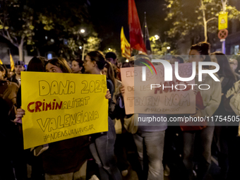 Catalan left-wing and independentist groups demonstrate in front of the headquarters of the Popular Party, led by the regional government of...