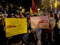 Catalan left-wing and independentist groups demonstrate in front of the headquarters of the Popular Party, led by the regional government of...