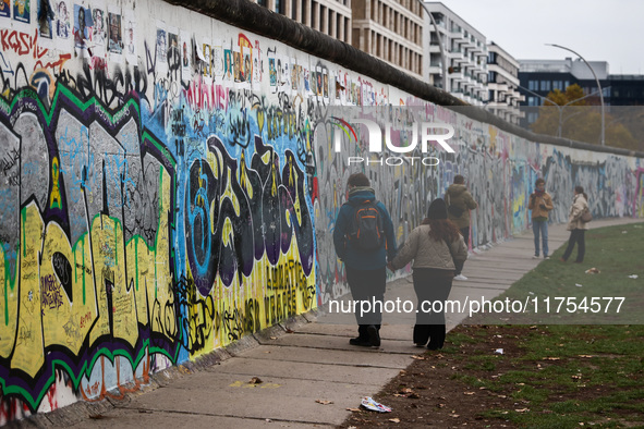  People visit East Side Gallery a day ahead of the 35th anniversary of the fall of the Berlin Wall. Berlin, Germany on November 8th, 2024. 