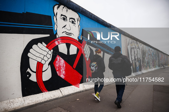 A mural with Mikhail Gorbachev at East Side Gallery a day ahead of the 35th anniversary of the fall of the Berlin Wall. Berlin, Germany on N...