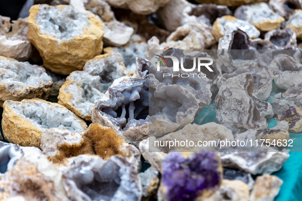 Mineral stones are seen on a stand in Djebel el Negueb  mountains in Chebika Oasis in central Tunisia on October30, 2024. 