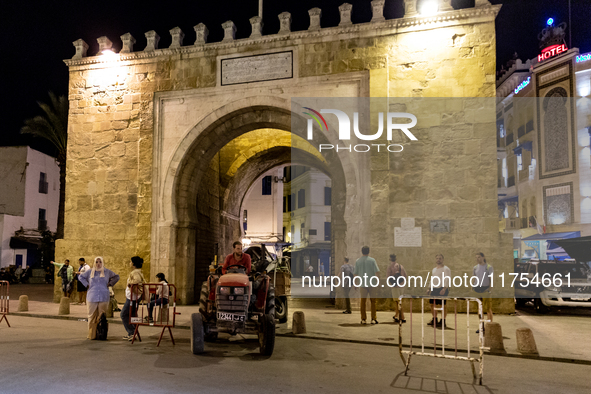 A tractor drives through Bab el Bhar an old gate in an Old Town of Tunis, the capital of Tunisia on November 2, 2024. 