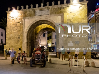 A tractor drives through Bab el Bhar an old gate in an Old Town of Tunis, the capital of Tunisia on November 2, 2024. (