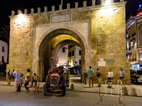 A tractor drives through Bab el Bhar an old gate in an Old Town of Tunis, the capital of Tunisia on November 2, 2024. (