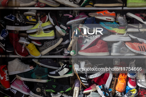 Shoe shop  with Ken doll in the shop window in an Old Town of Kairouan in central Tunisia on October30, 2024. 