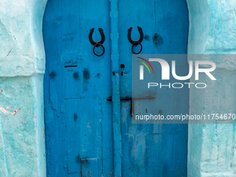 Tupical residential home door in an Old Town of Kairouan in central Tunisia on October30, 2024. (