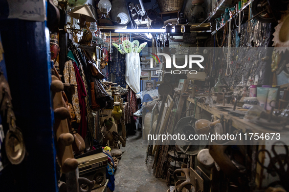 A man sell in his second hand shop in an Old Town of Kairouan in central Tunisia on October 31, 2024. 