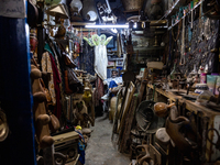 A man sell in his second hand shop in an Old Town of Kairouan in central Tunisia on October 31, 2024. (