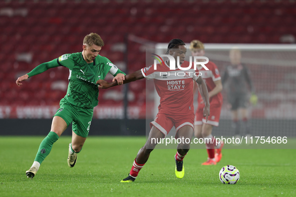 Hareem Bakre of Middlesbrough competes for possession with Veit Stange of Borussia Monchengladbach during the Premier League International C...