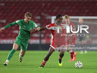 Hareem Bakre of Middlesbrough competes for possession with Veit Stange of Borussia Monchengladbach during the Premier League International C...