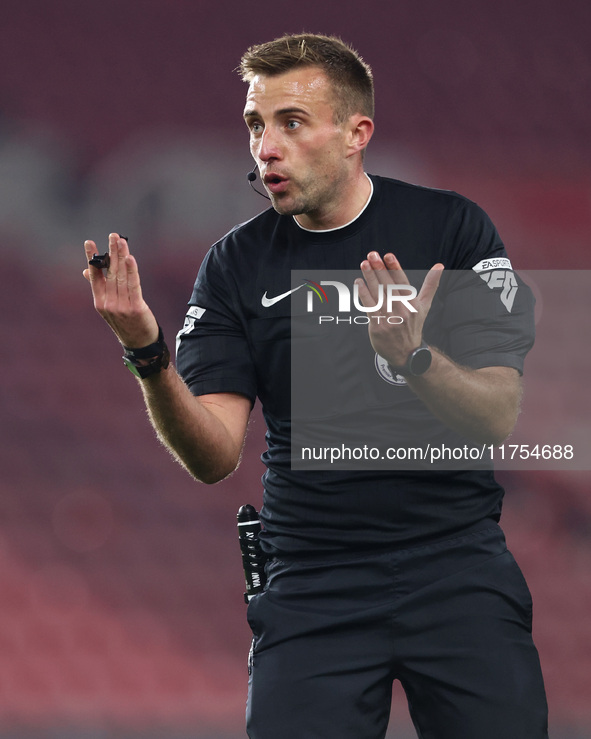 Match referee Adam Herczeg officiates during the Premier League International Cup match between Middlesbrough Under 21s and Borussia Monchen...