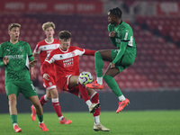 Ajay Matthews of Middlesbrough competes with Charles Herrmann of Borussia Monchengladbach during the Premier League International Cup match...