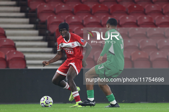 George Gitau of Middlesbrough competes against Joshua Uwakhonye of Borussia Monchengladbach during the Premier League International Cup matc...