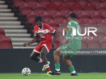 George Gitau of Middlesbrough competes against Joshua Uwakhonye of Borussia Monchengladbach during the Premier League International Cup matc...