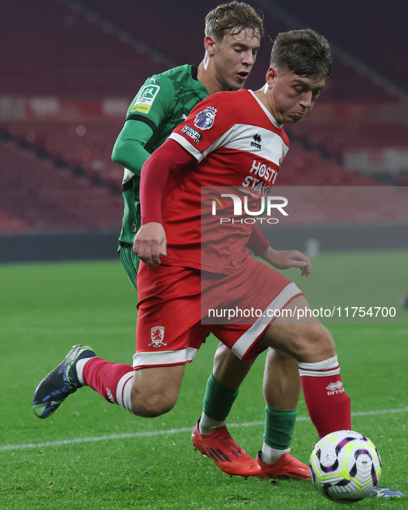 Middlesbrough's Sonny Finch is in action with Borussia Monchengladbach's Niklas Swider during the Premier League International Cup match bet...