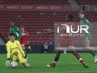 Maximillian Neutgens of Borussia Monchengladbach saves from Hareem Bakre of Middlesbrough during the Premier League International Cup match...