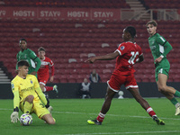 Maximillian Neutgens of Borussia Monchengladbach saves from Hareem Bakre of Middlesbrough during the Premier League International Cup match...