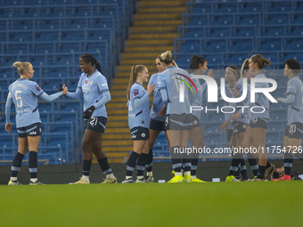 Khadija Shaw #21 of Manchester City W.F.C celebrates her goal with teammates during the Barclays FA Women's Super League match between Manch...